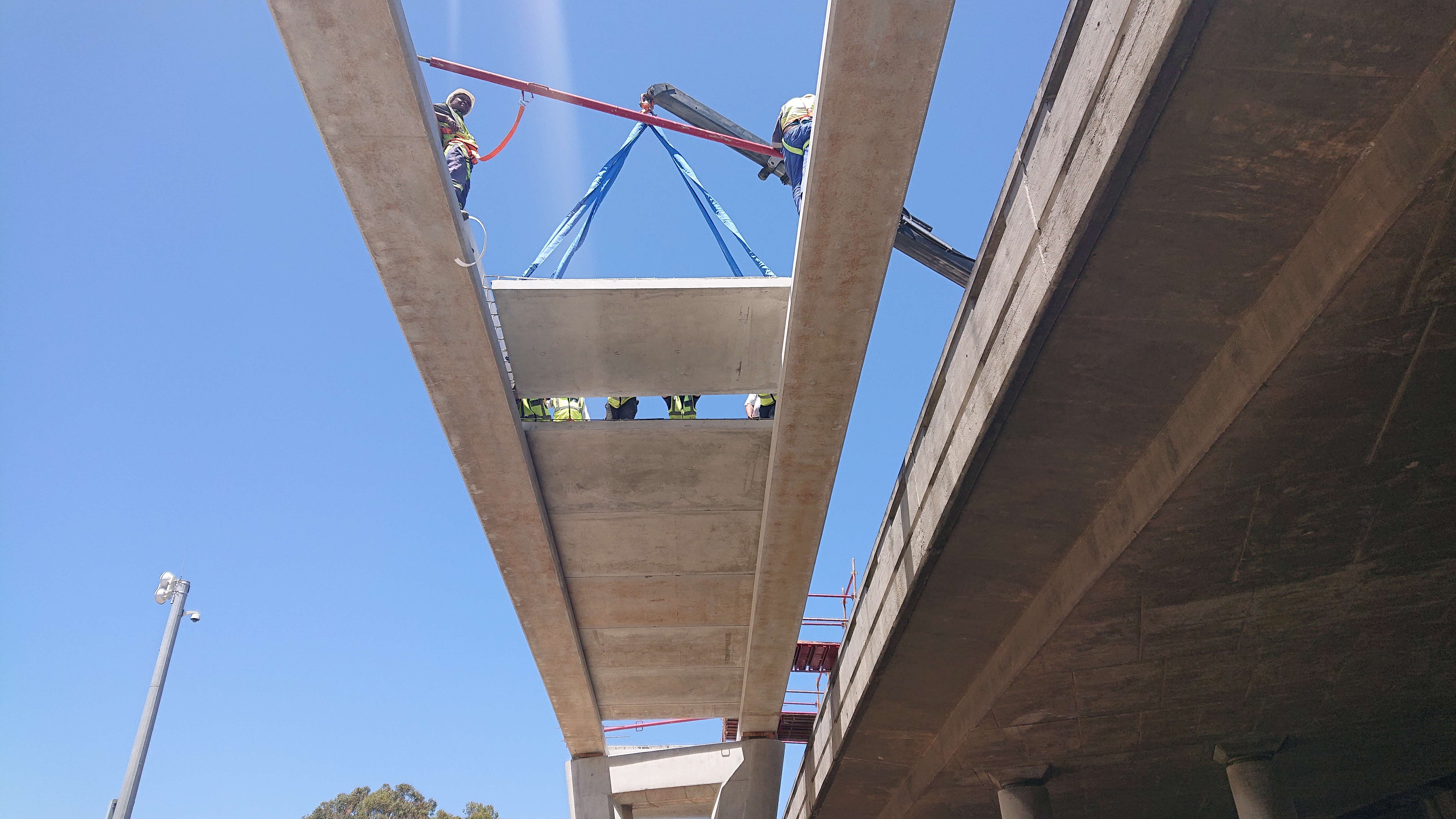 Figure 12: Placing of precast concrete slabs (Phot Credit N De Mink)